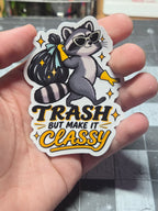 Close-up of "Trash but make it classy" raccoon vinyl sticker