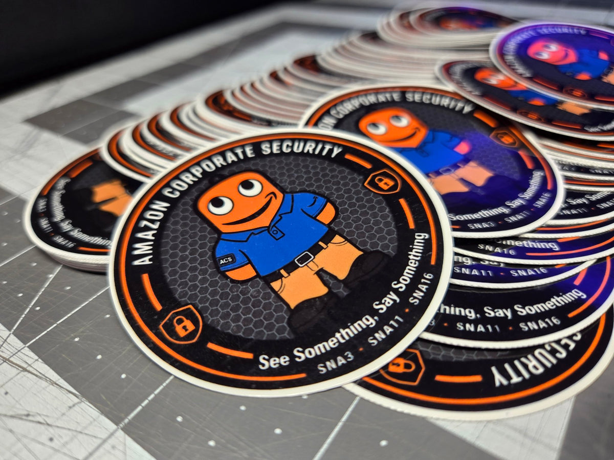 Stacks of round corporate custom vinyl stickers