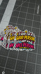 Stack of colorful die-cut vinyl stickers on cutting mat